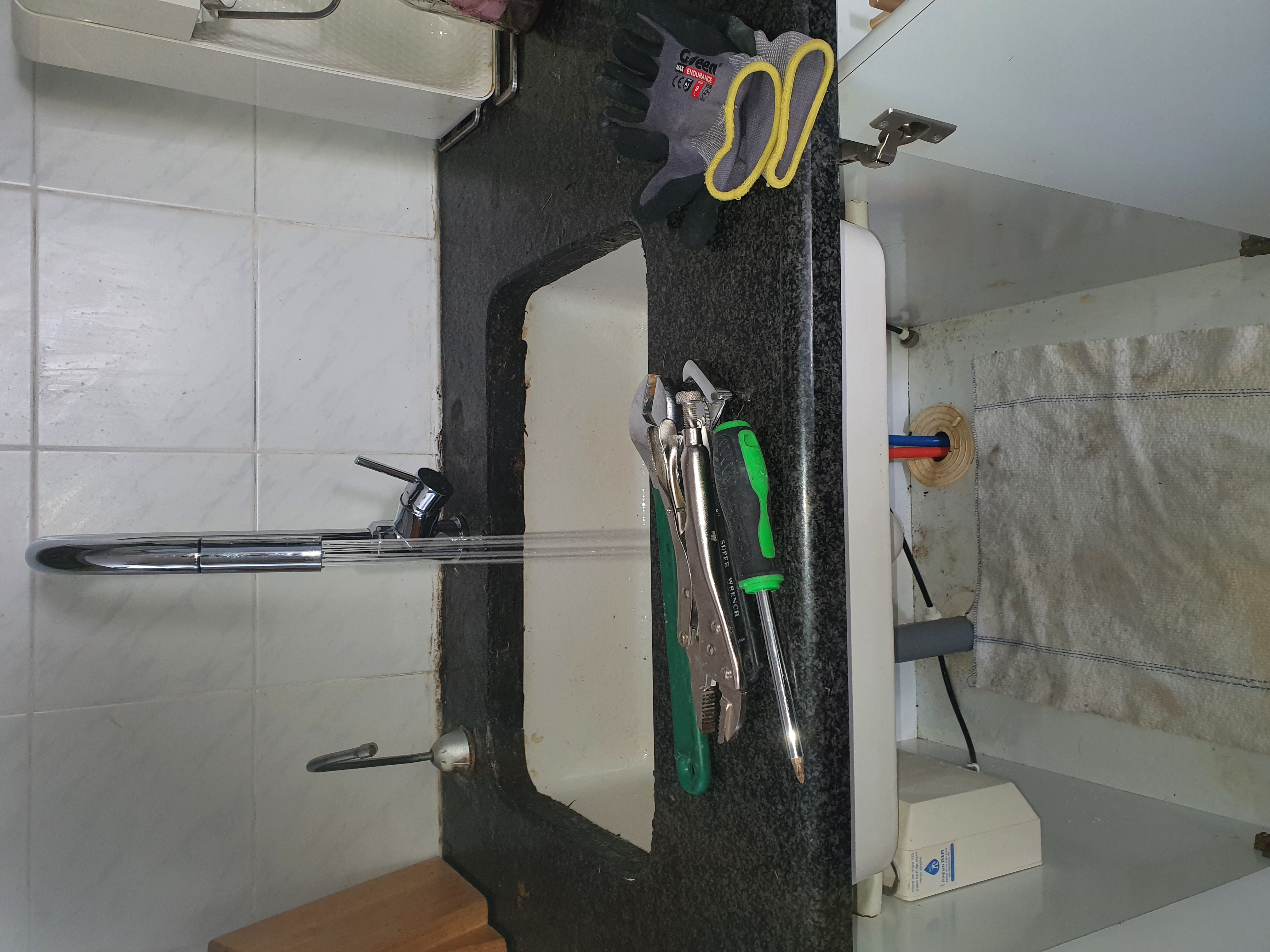 After: kitchen sink with a new tall tap fitted